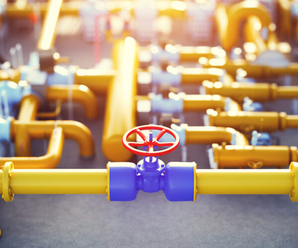 Gas valve on pipeline at natural gas station. Industry