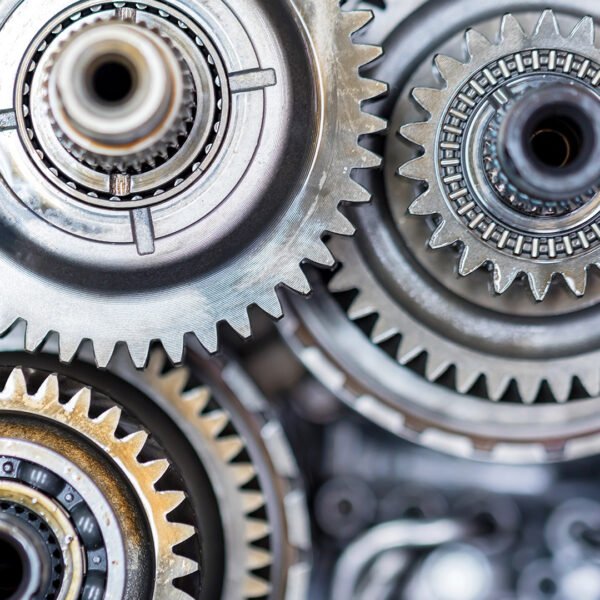 Planetary gearsets inside vehicle automatic transmission. Close up view in mechanic workshop during repairing