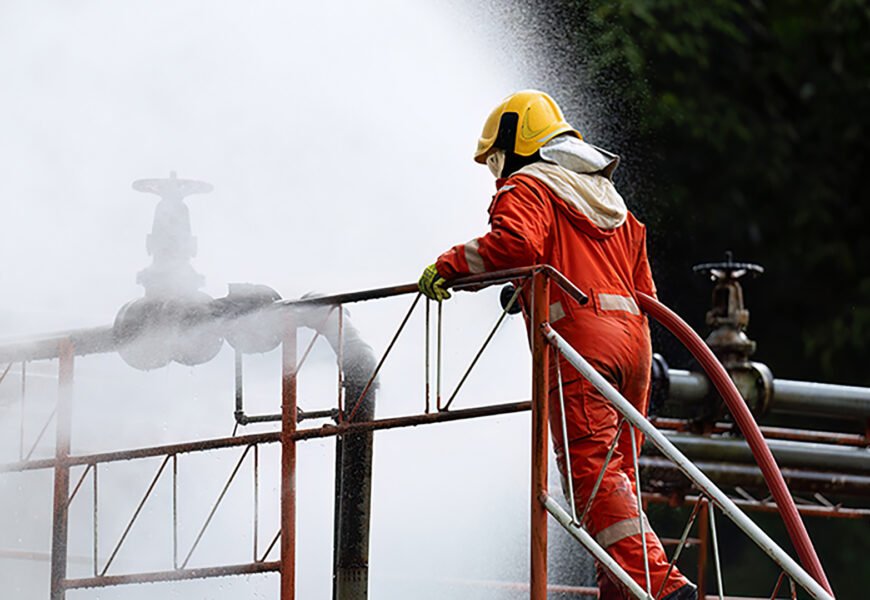 Fire fighter team on training with gas and oil fire at pipe line