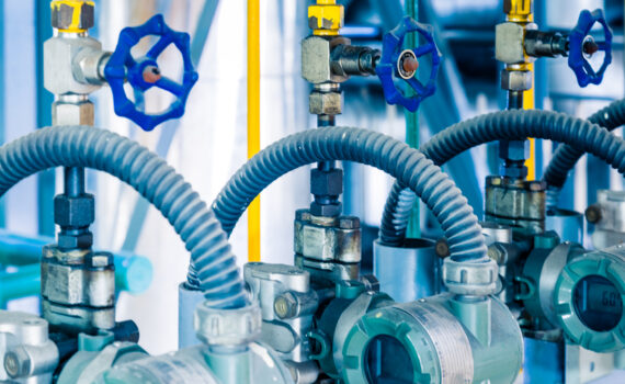 steel pipelines and cables in a plant,Industrial zone.