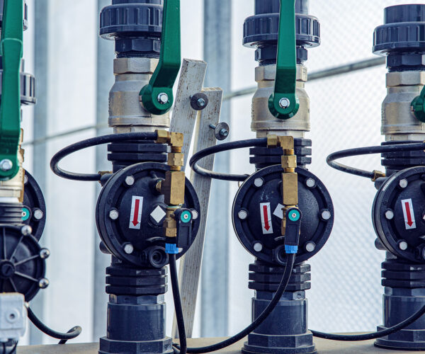 Valves, cables and piping as found inside of a modern industrial power plant